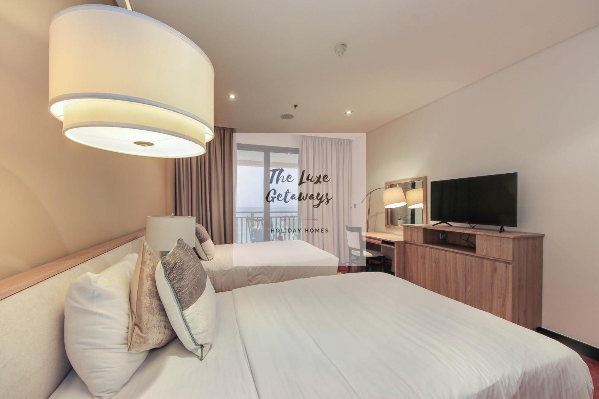 Luxe Getaways Royal Amwaj Palm Jumeirah Resort Apartment Holiday Home Dubaï Extérieur photo